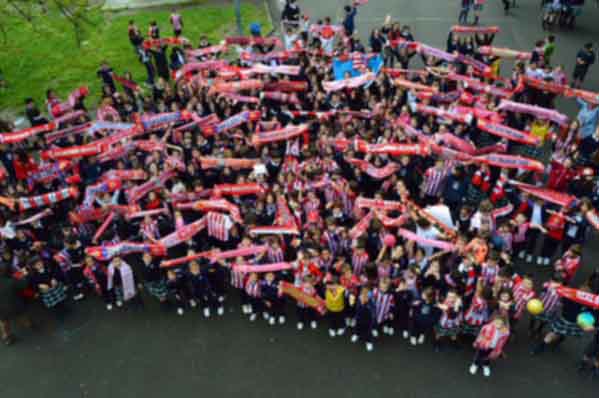 Los colegios de Gijón se llenan de rojo y blanco Sporting1905